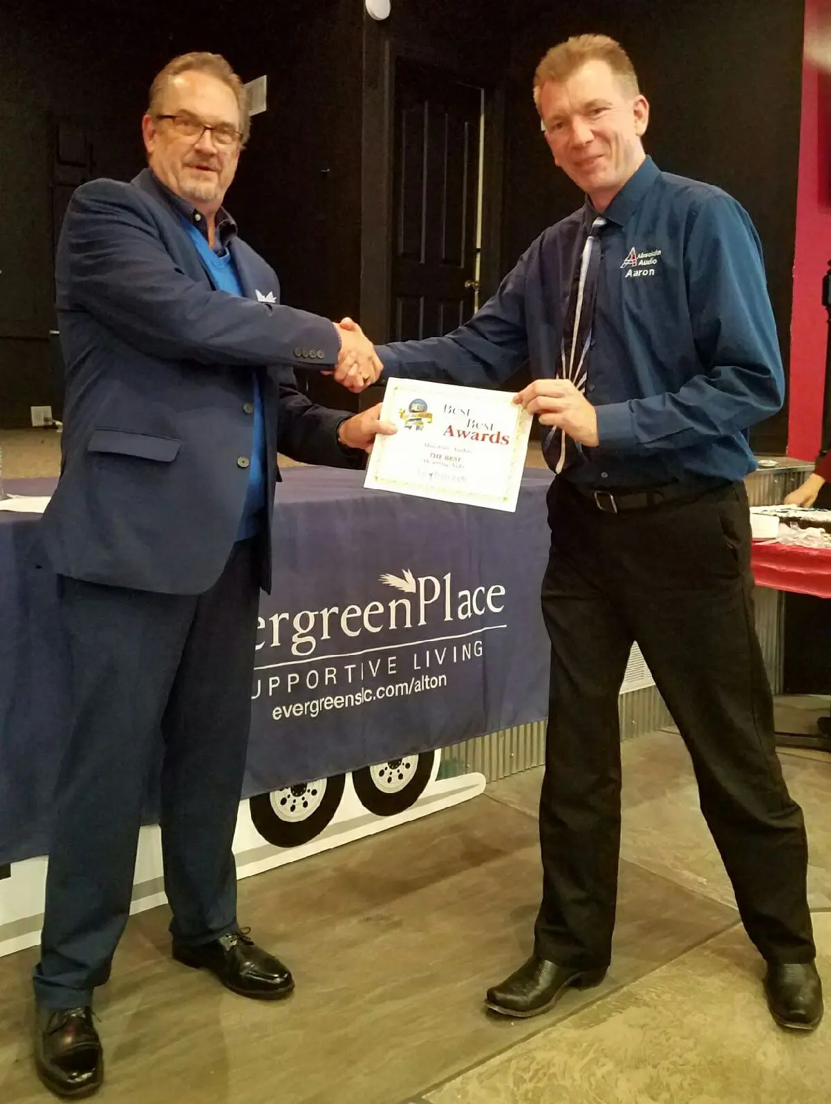 Aaron Gingrich receiving Best Hearing Aid Award